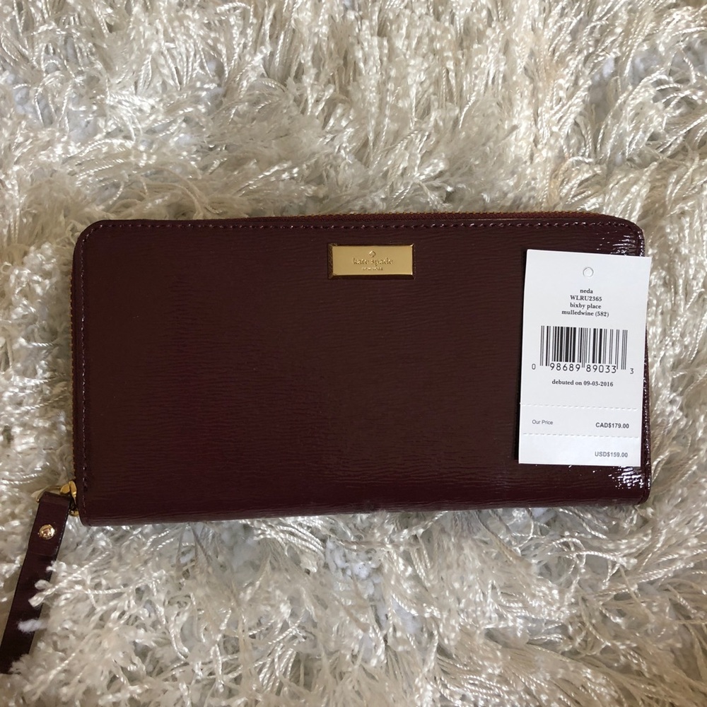 Kate Spade NWT mulled wine zipper wallet